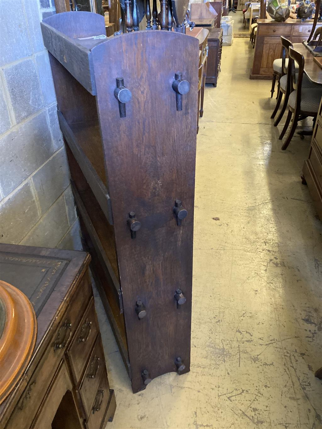 An early 20th century Wylie and Lochead style oak open bookcase, length 95cm, depth 26cm, height 130cm